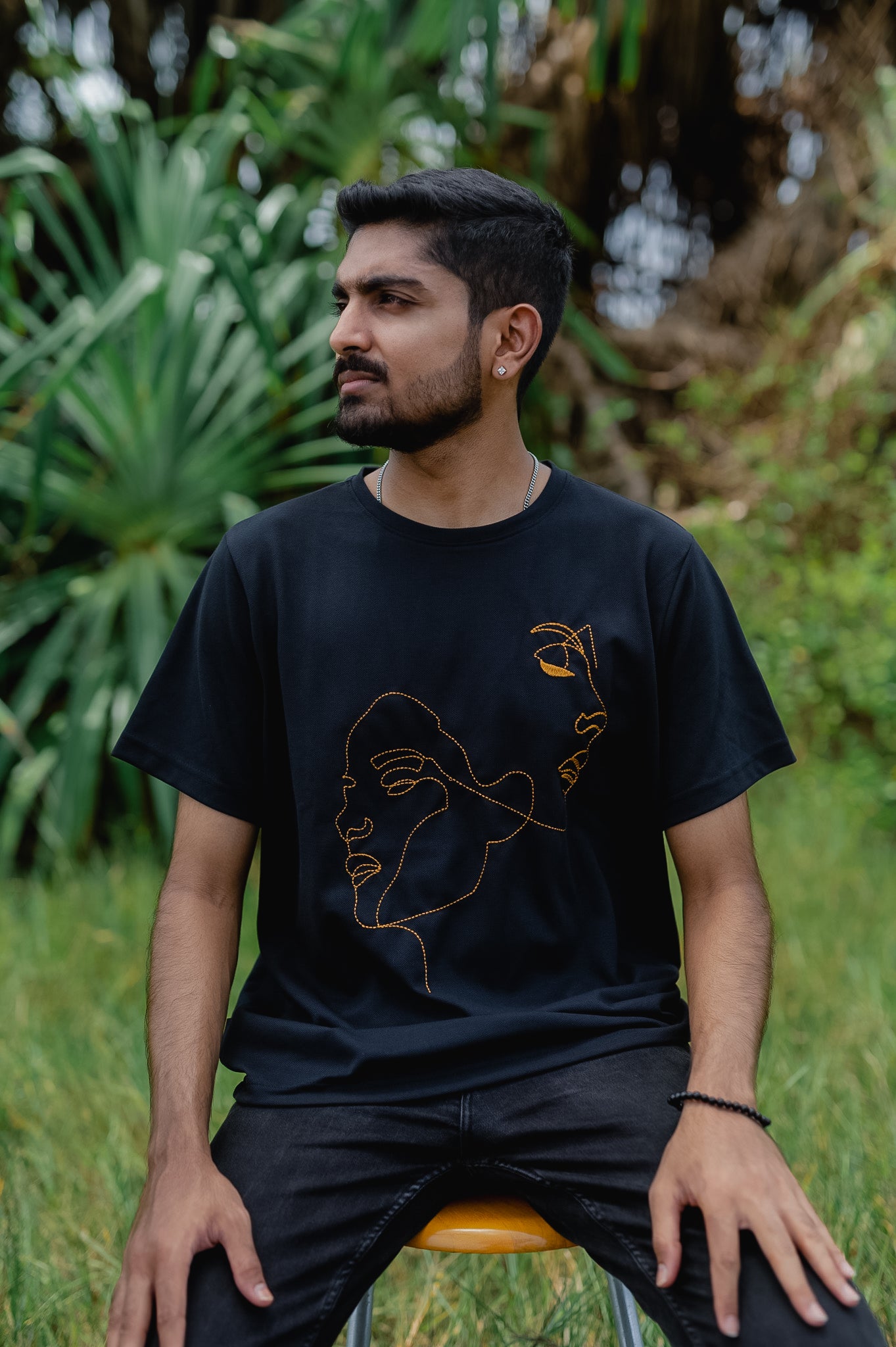 TRIVES Two Faces Golden Embroidered T-shirt - man wearing front